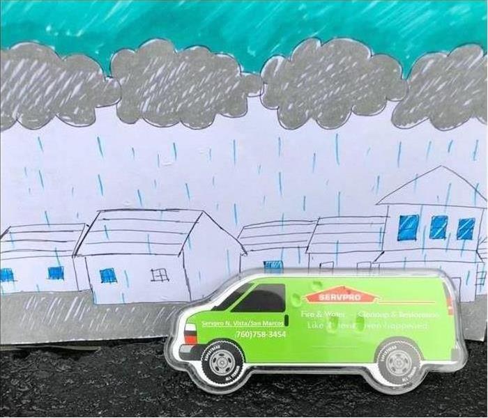SERVPRO truck in front of rainy drawn scene. 
