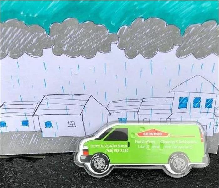 Pencil drawn rain with SERVPRO van magnet